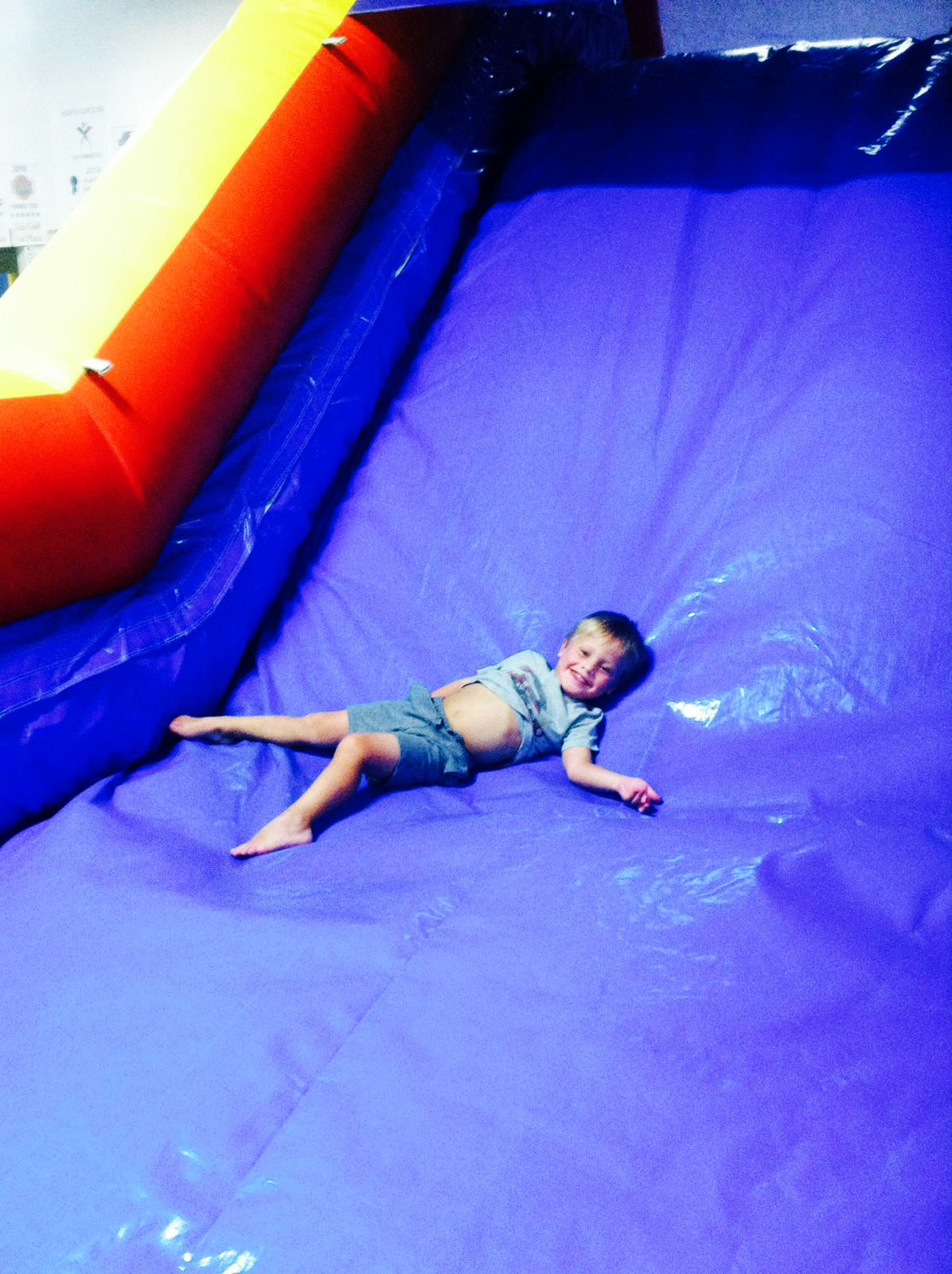 A child has fun in one of the areas of the gym